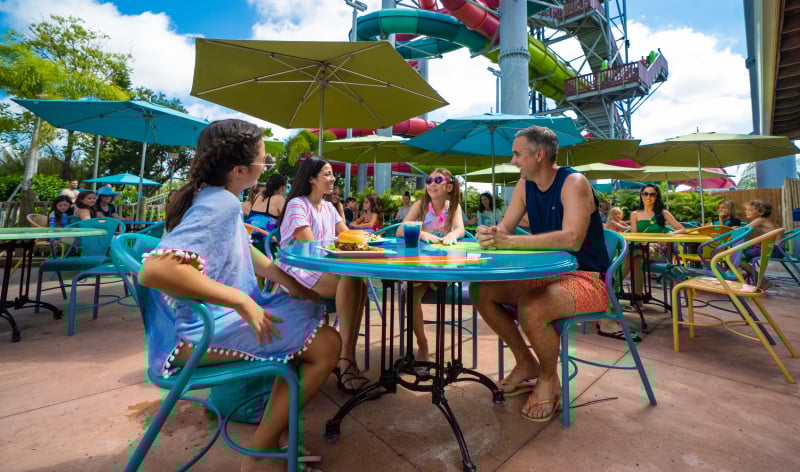 Family eating a meal at Aquatica Orlando