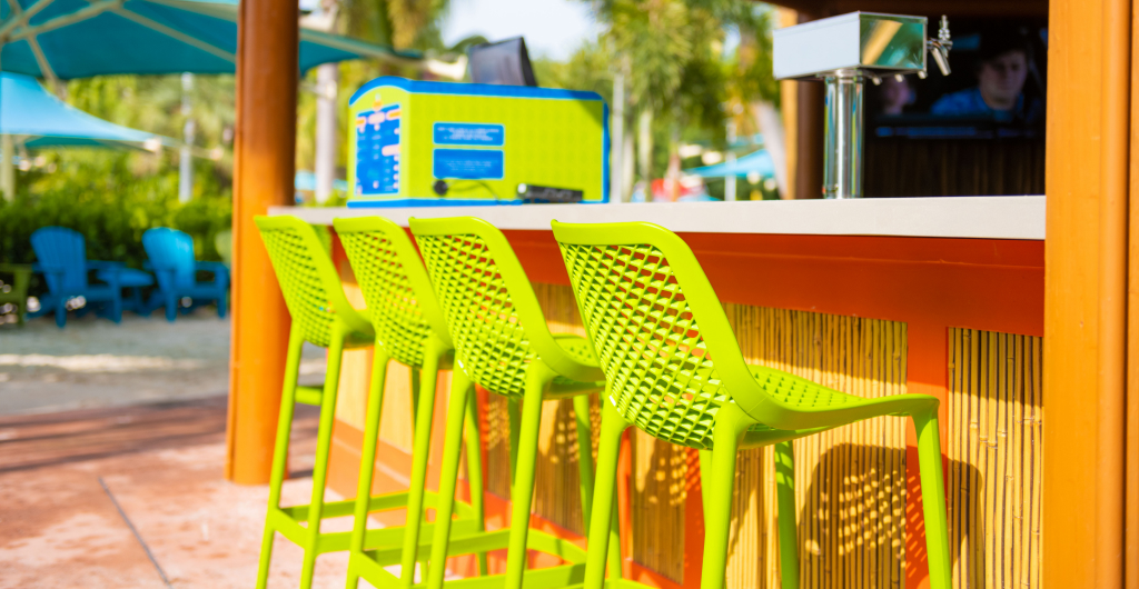 Colorful barstools at a bar