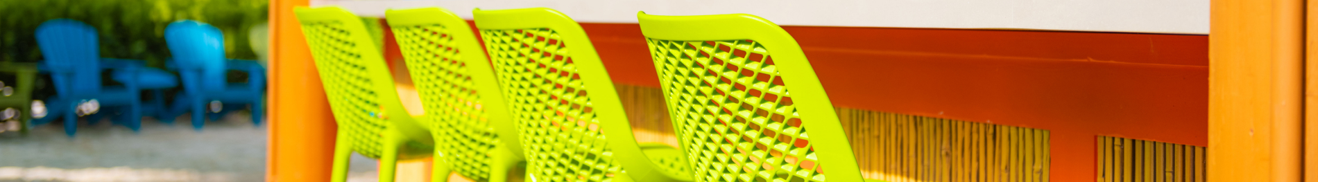 Colorful barstools at a bar