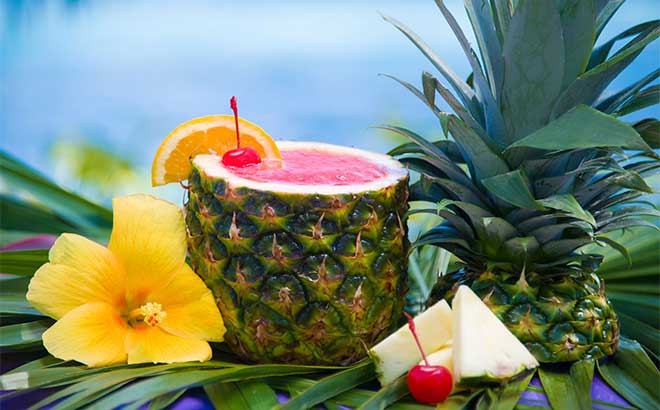 Taste delicious tropical drinks while you relax on the sandy beaches of Aquatica.