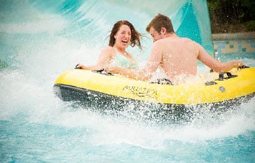 Take a slide down Wahalla Wave with your family at Aquatica.