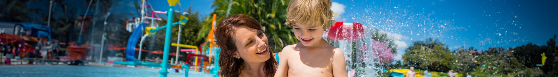 Mother and Child playing at one of the many Kid-Friendly attractions at Aquatica San Antonio.